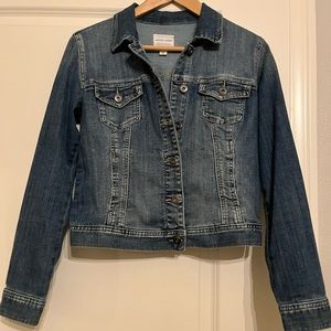 Denim jacket w/ruffles across the back  and along the arms. Excellent condition